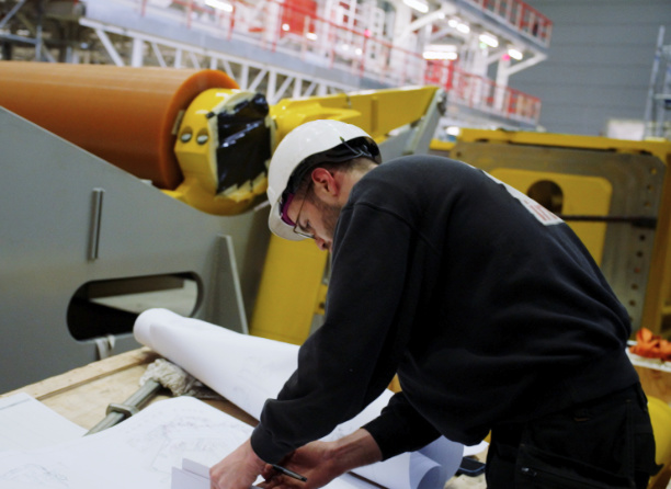 REAL employee doing project management on the factory floor