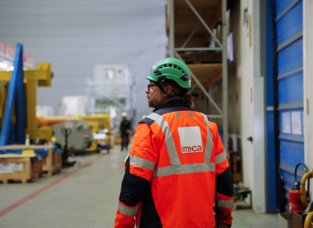 a REEL mechanical fitter wearing protective clothing to protect his health
